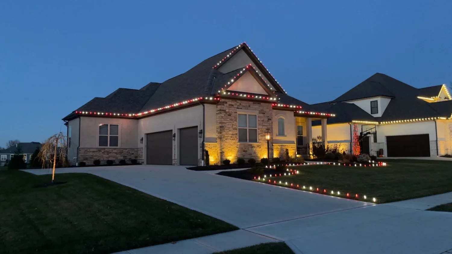 Warm white and red professional holiday lighting inspiration